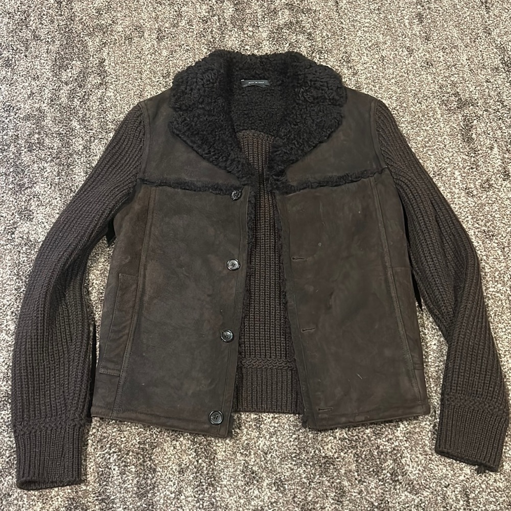 Gucci leather jacket with sherling lamb fur.